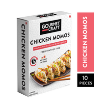 Load image into Gallery viewer, A pack of frozen chicken momos with the momos pick on it with the name.
