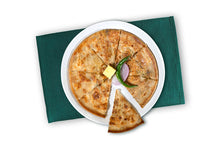 Load image into Gallery viewer, Sliced jalapeno cheese paratha which is kept on a white plate with butter, onion slice and green chilli as garnish kept on a dining cloth.
